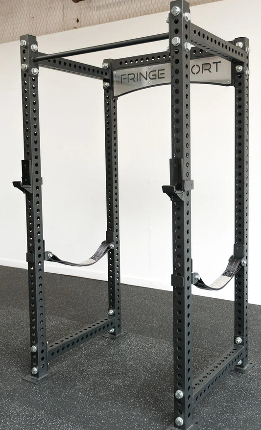 3x3 nylon safety straps installed on a power rack as a catch system for squats and bench press